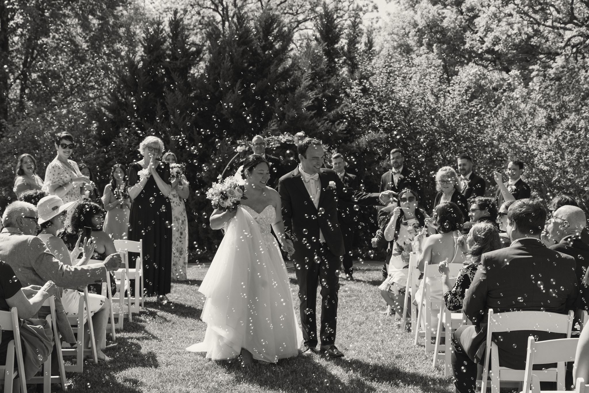 wedding couple just married bubble exit